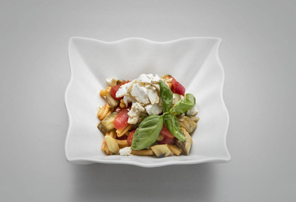 Strozzapreti with aubergines, fresh tomatoes and smoked ricotta cheese