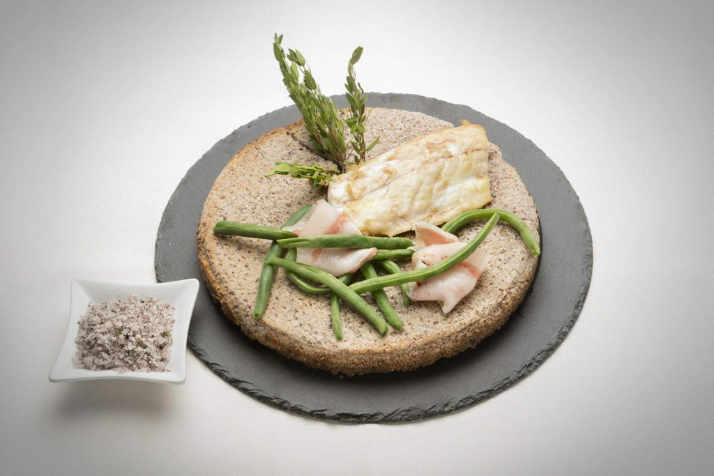 Sea bass fillets on myrtle salt plate with cheek lard green beans 